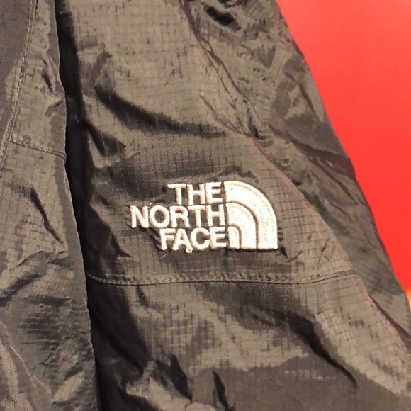 Black north face Hyvent rain jacket with hood and mesh pocket on front - Picture 7 of 8